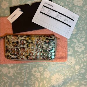 Authentic Brahmin Wristlet NWT bag receipt plus certificate. Cheetah print